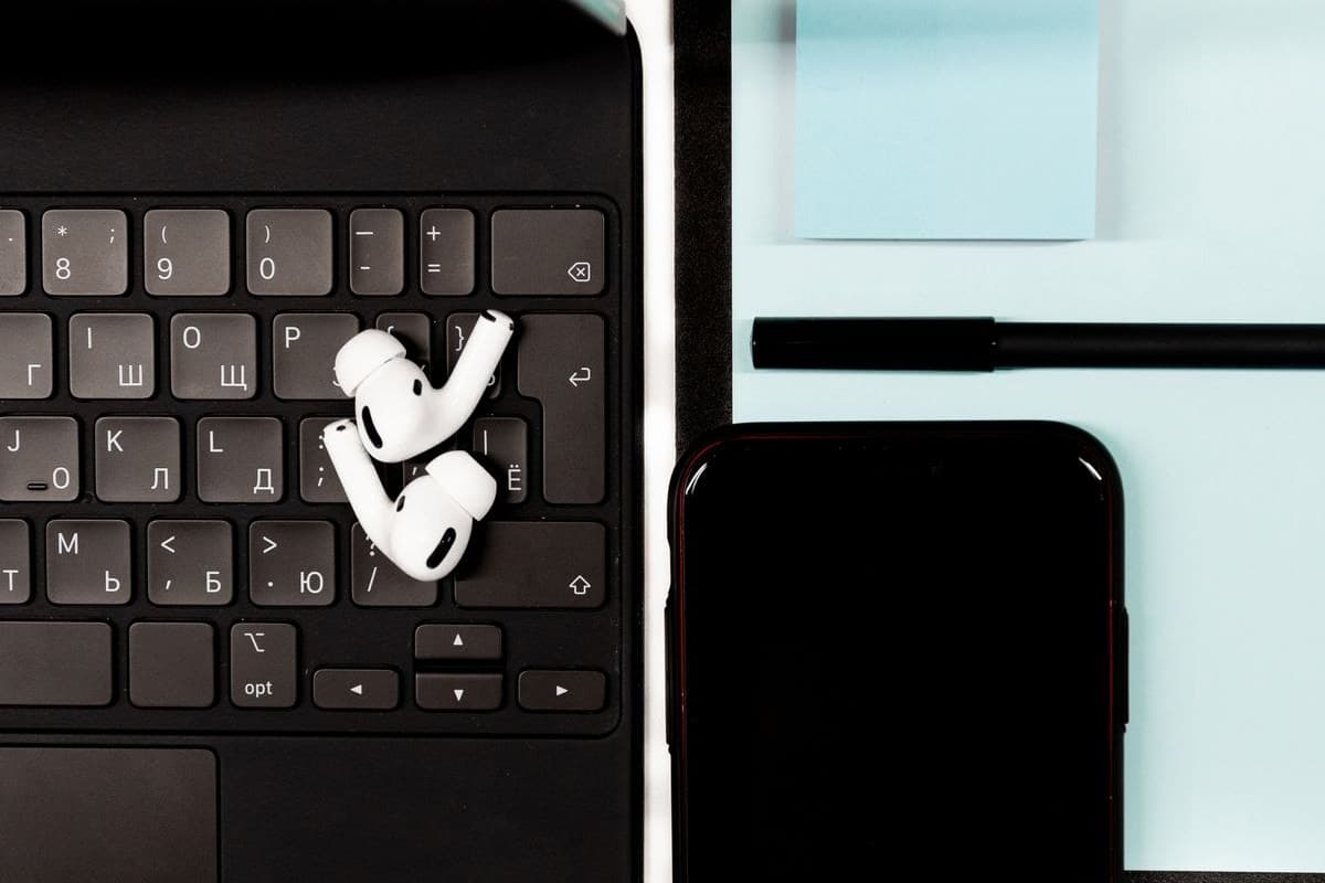 A flat lay of products and devices: comparing candidates before picking one to sell