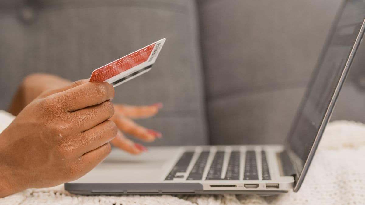 A shopper paying online with a credit card during the Black Friday sales